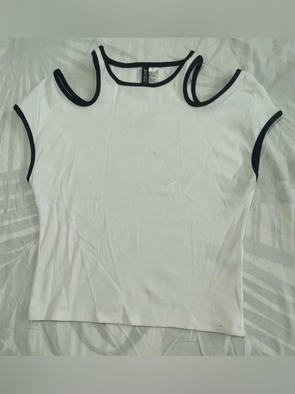 Divided White Ribbed Cold-Shoulder Top with Black Trim